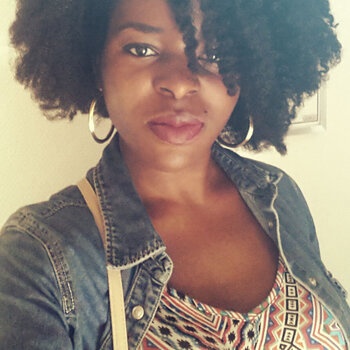 Poupée Kinky Shares Her Coily Hair Journey